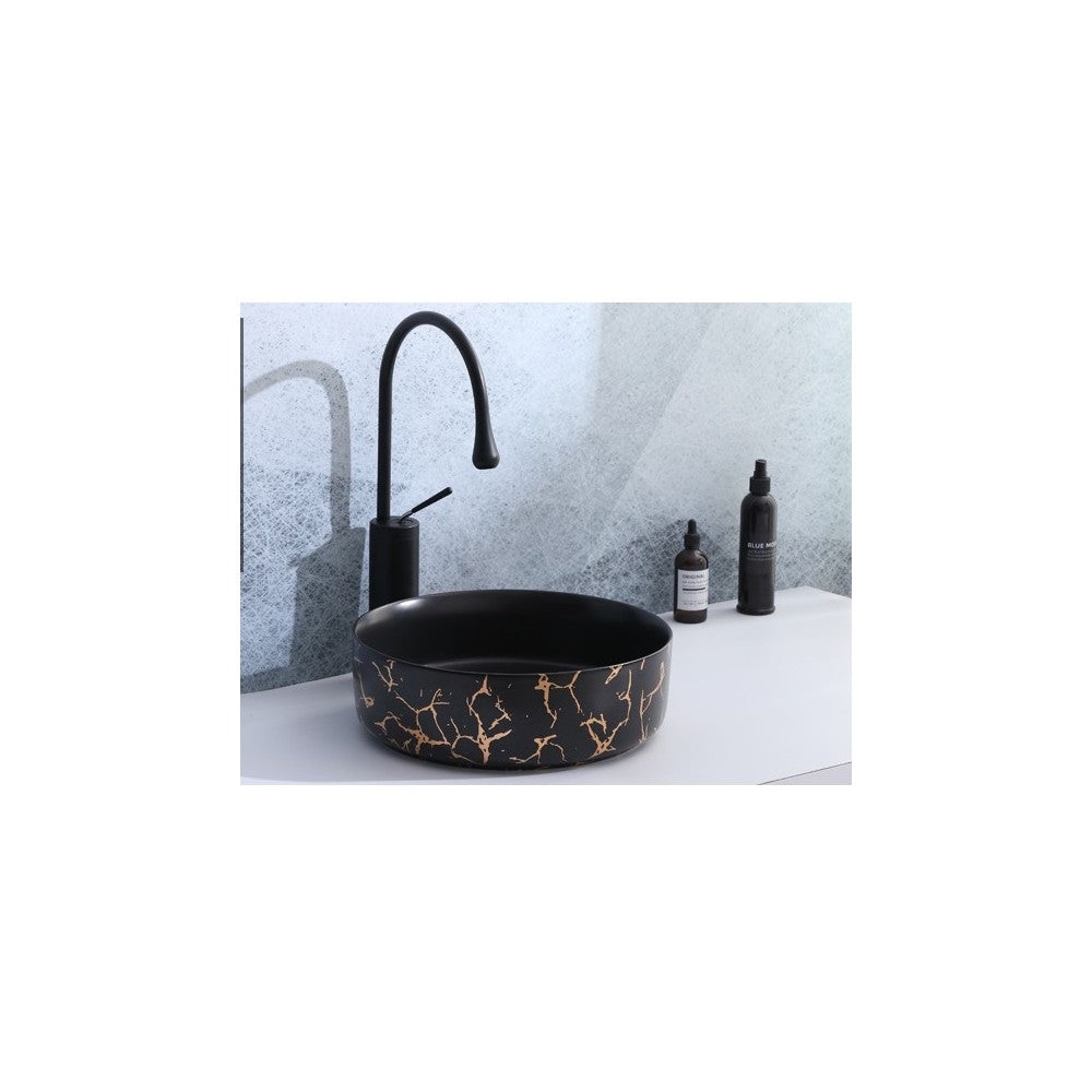Epona, lavabo rond en porcelaine avec fini noir mat et marbrure dorée